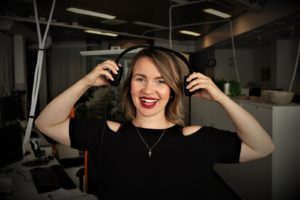 Woman headphones podcast start